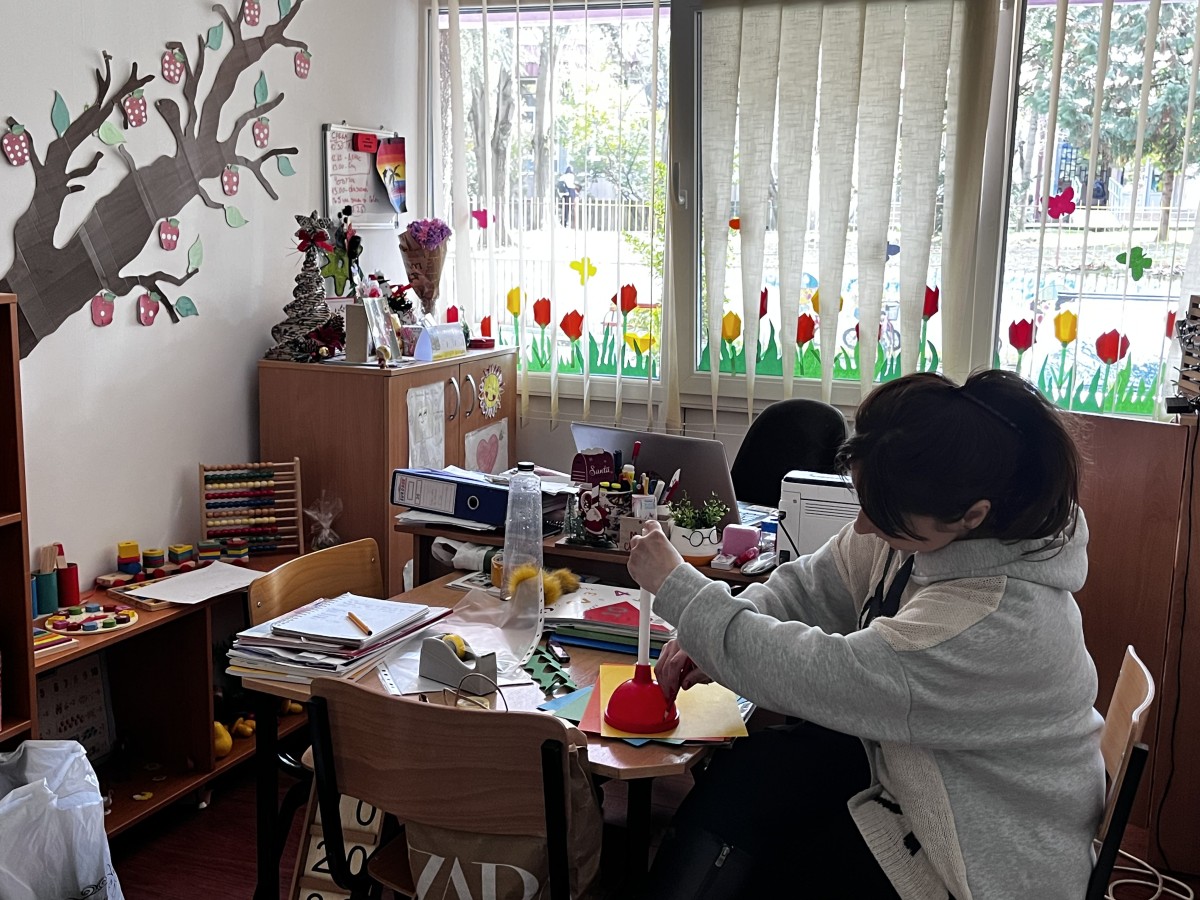 An employee working on a project for a childrens class.